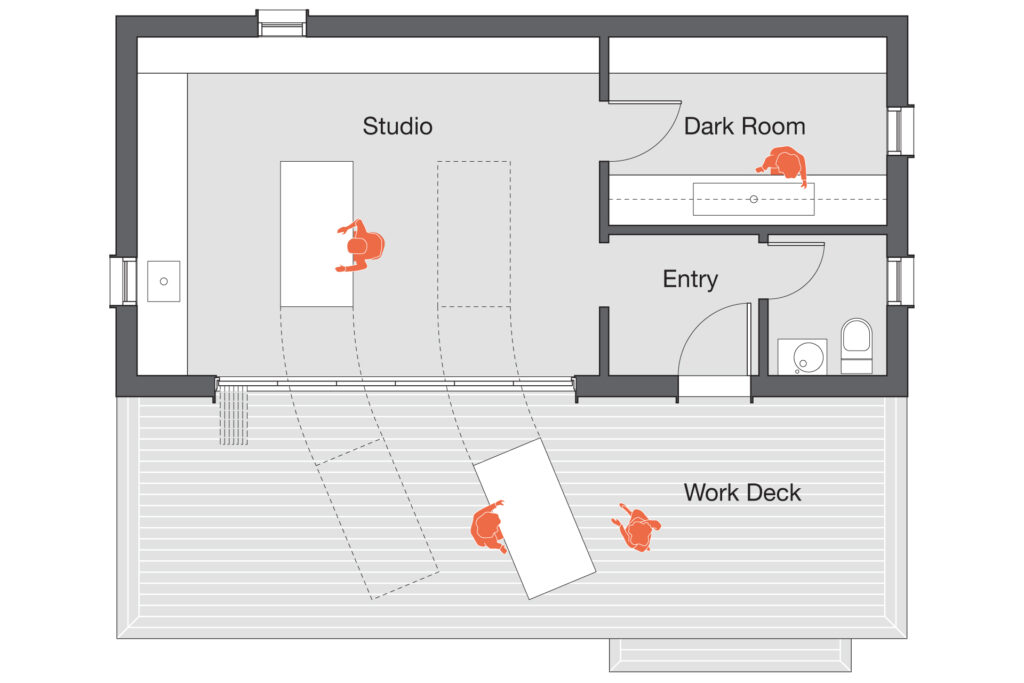 The floor plan drawing shows the work space, dark room, entry, and work deck.