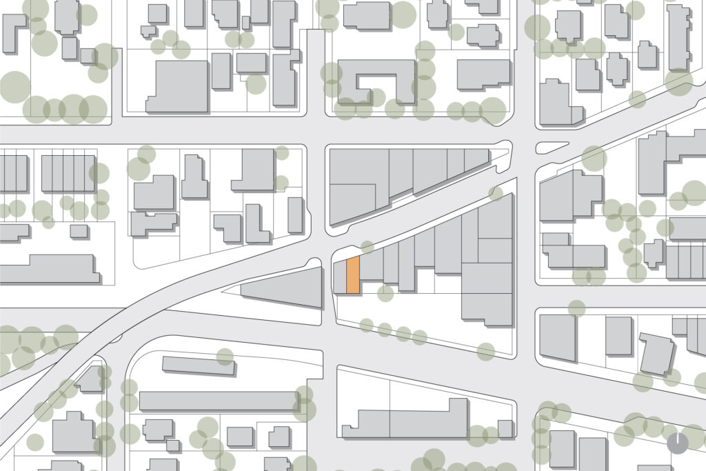 Vicinity plan of Multnomah Village with the project building highlighted in orange.